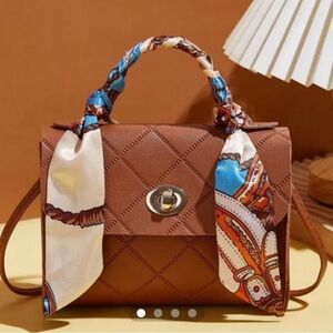 Brown Crossbody Bag with Quilted Design and Unique Strap